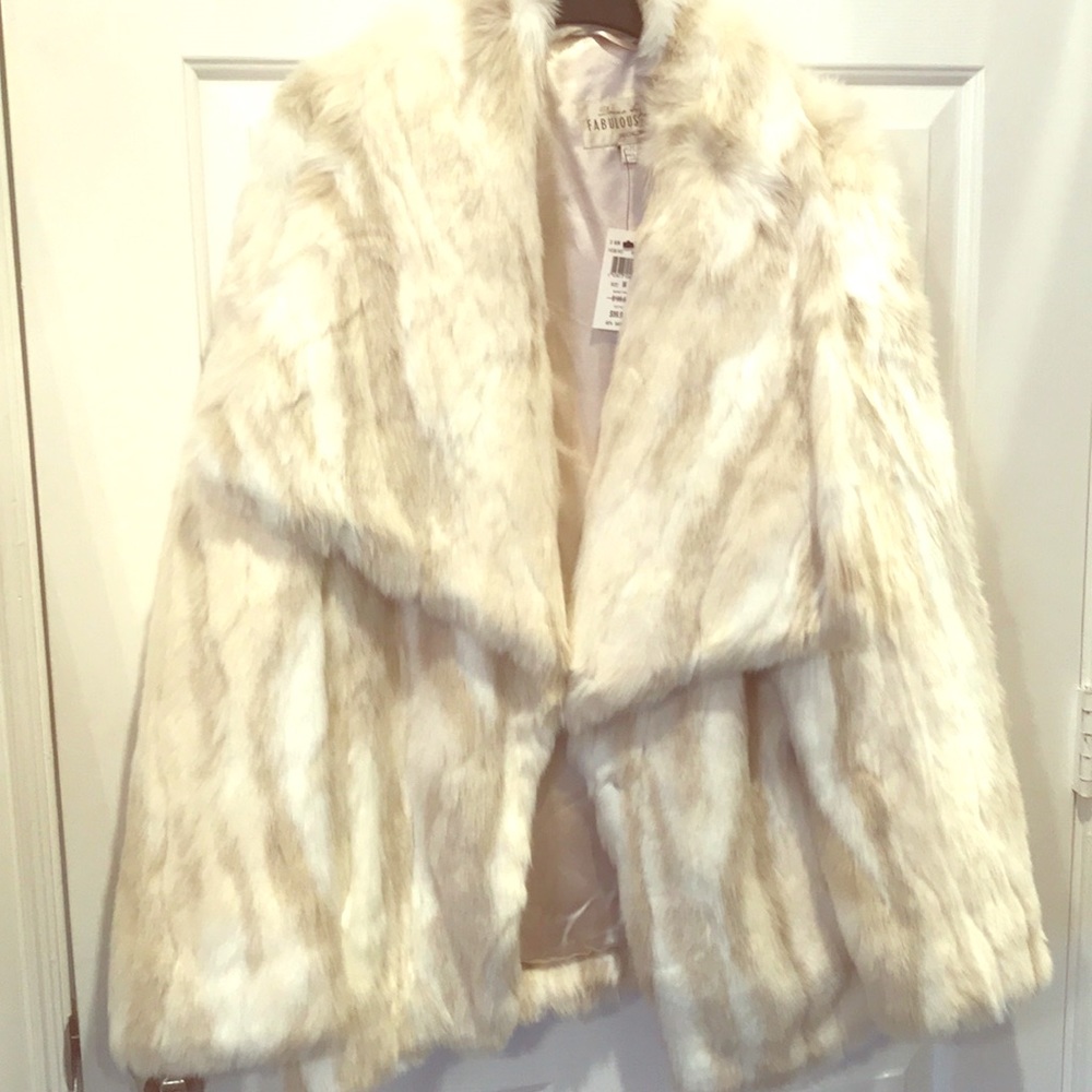 Beautiful faux fur coat .